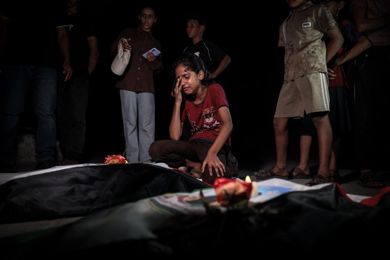GAZA CITY, GAZA, PALESTINE - SEPTEMBER 5: Palestinians mourn the bodies of their relatives recovered from the rubble of Israeli military attacks on September 5, 2026 in Zeitoun, Gaza City, Gaza, Palestine. Grieving families of more than 100 victims, including at least 70 children, gathered to claim their loved ones' remains ahead of funeral arrangements. (Khames Alrefi - Anadolu Agency)