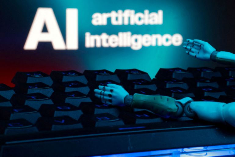 File photo: Reading a message "AI artificial intelligence"A keyboard and robot arms can be seen in this illustration taken on January 27, 2025. REUTERS/Dado Ruvic/Illustration/File Photo