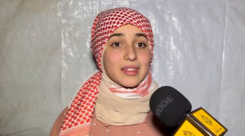 A Palestinian girl sings the praises of Abu Ubaydah with rousing poetic verses