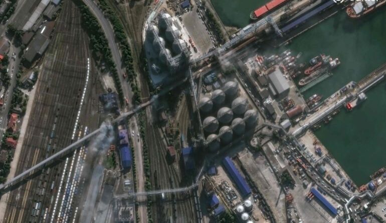 A satellite image shows smoke rising near a grain factory in the Russian port of Novorossiysk following strikes by Ukraine.
