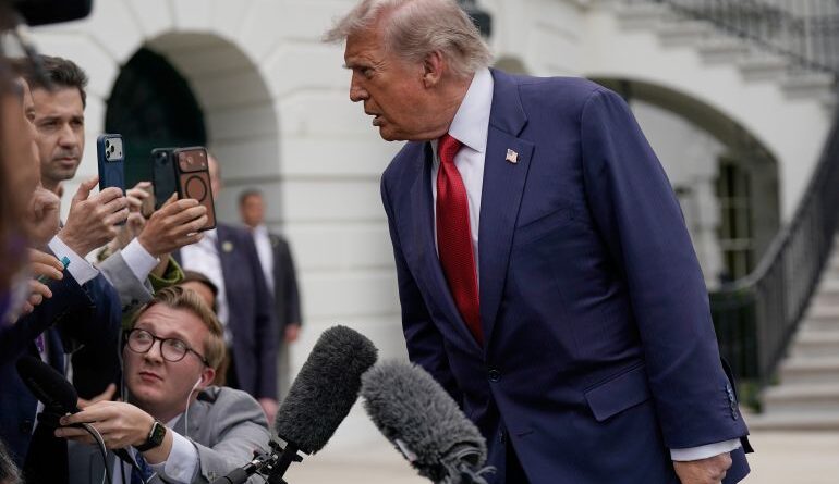 President Donald Trump speaks to reporters as he boards Marine One on the South Lawn of the White House, Friday, May 8, 2026, in Washington. (AP Photo/Jose Luis Magana)