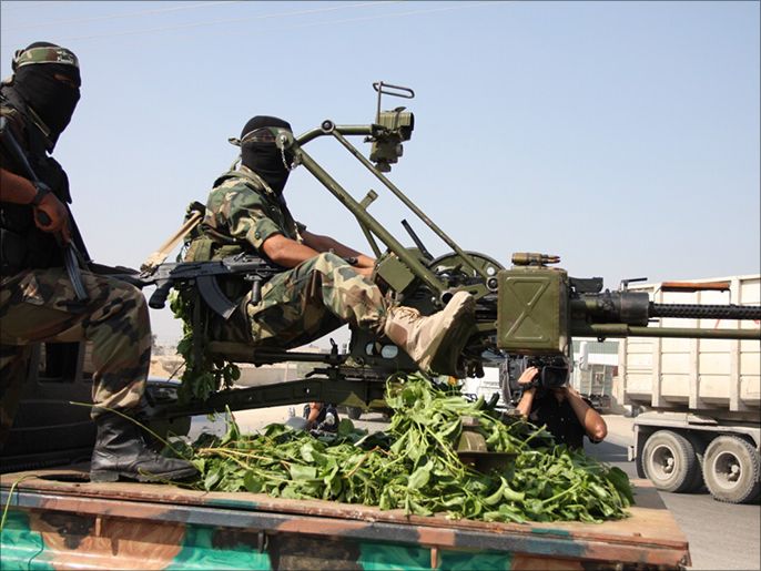 A vehicle carrying weapons and transporting members of the Izz al-Din al-Qassam Brigades, the military wing of the Islamic Resistance Movement, Hamas.
